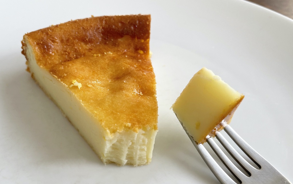 a piece of lemon yoghurt flan cake on the serving plate