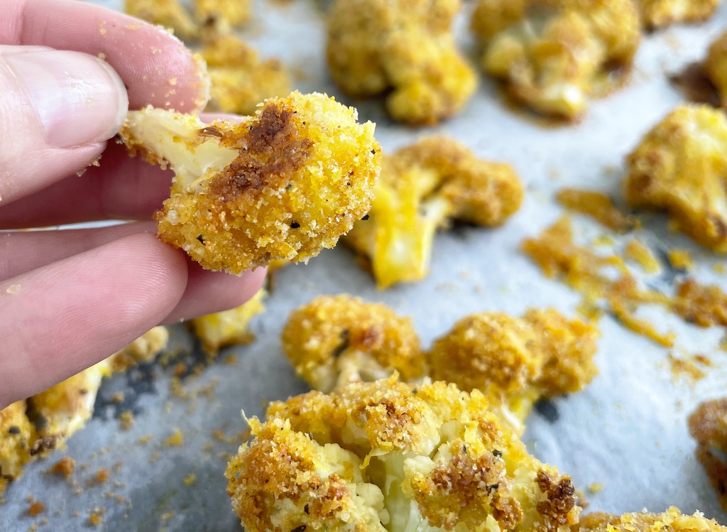 cauliflower bites with one in the hand