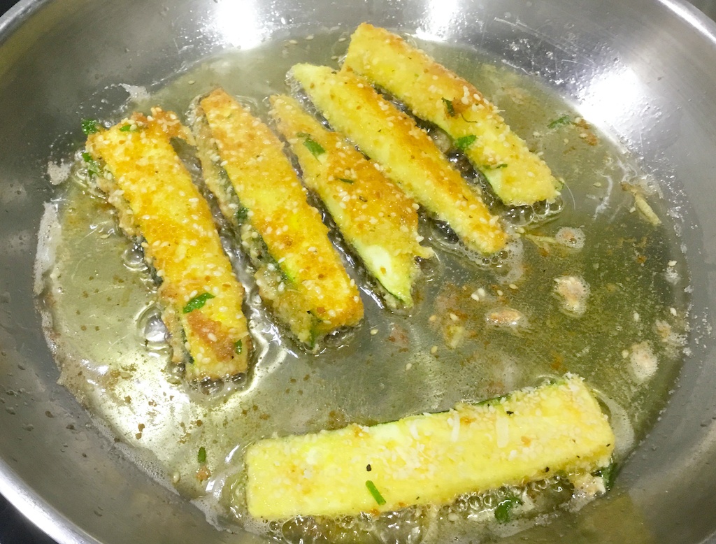 courgette fries on the frying pan
