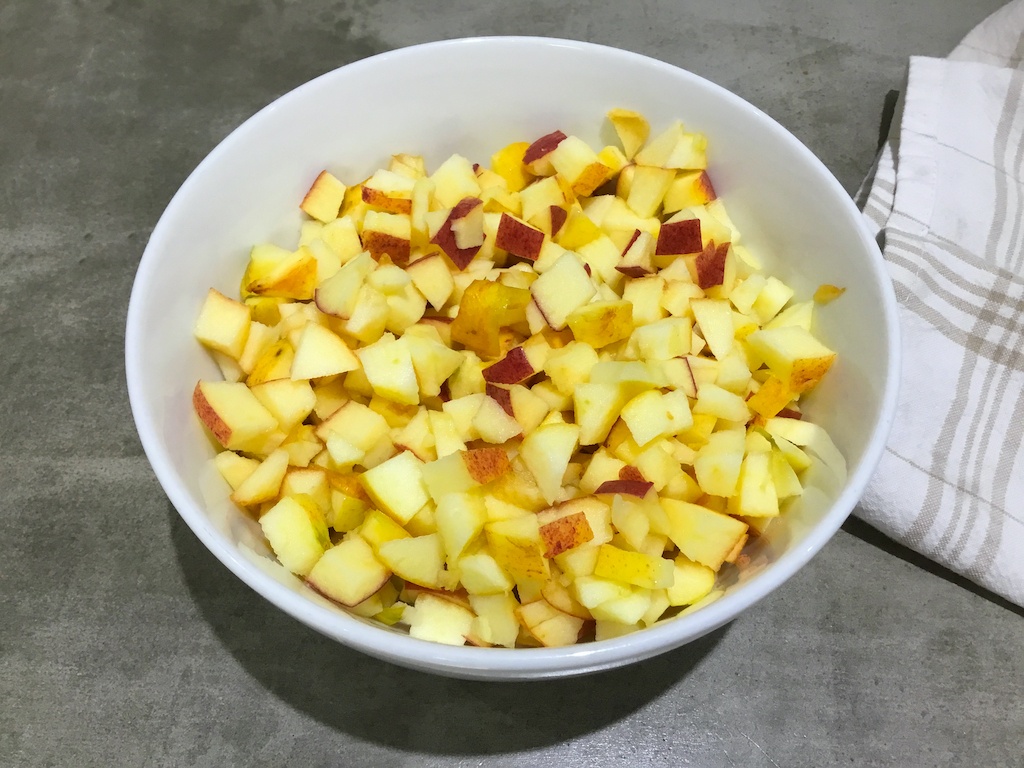 cubed apples in a bowl ready for yeast pancakes