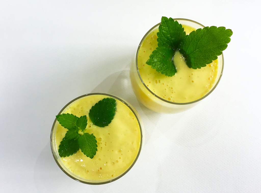 mango lassi two glasses seen from the top