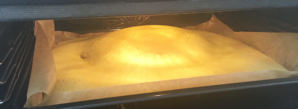 pannukakku pancake while baking in the oven