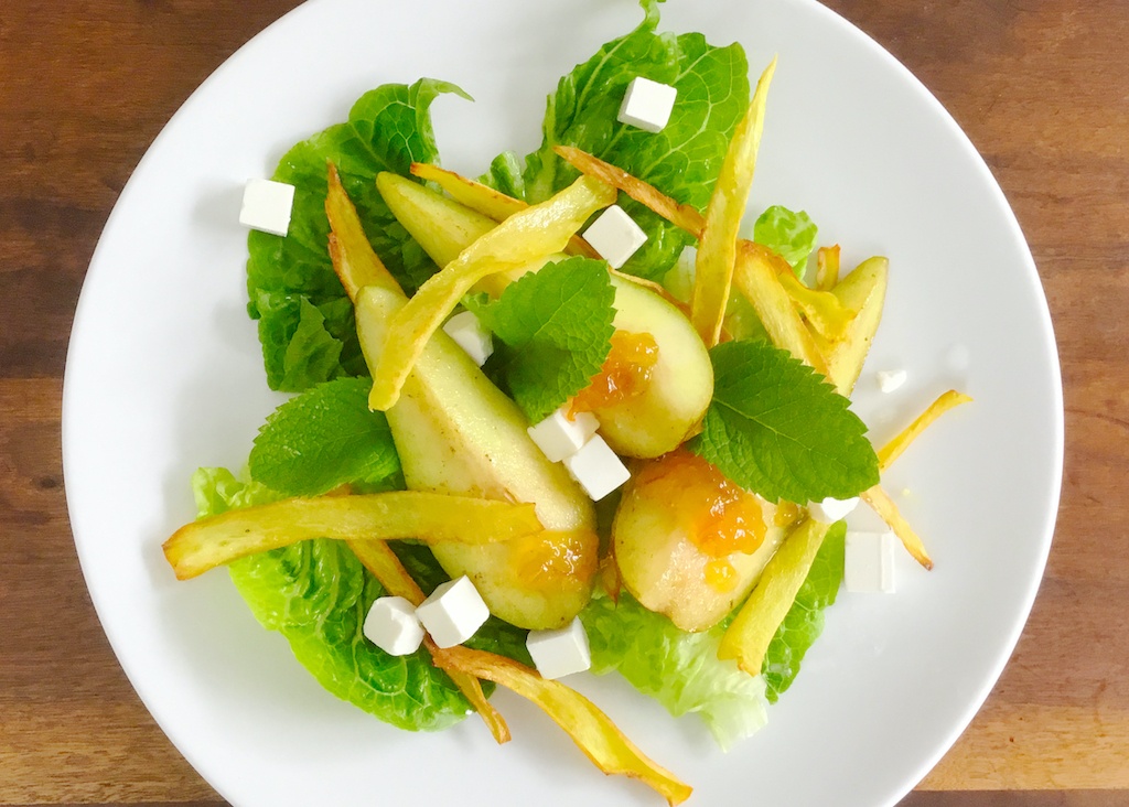 pear and parsnip crisps salad on the plate from the top